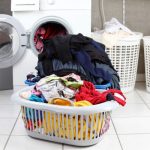 A pile of clothes in a Laundry basket 1